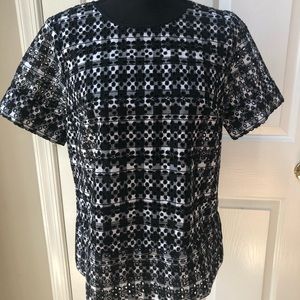 Black and white piqued zipper blouse